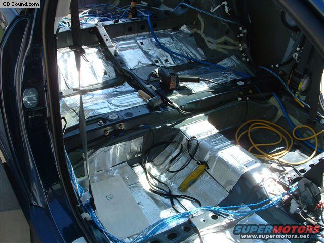 Edead installation costs $1/sq. ft., considerably cheaper than Dynamat, etc.  
http://www.edesignaudio.com/category.php?type=damp