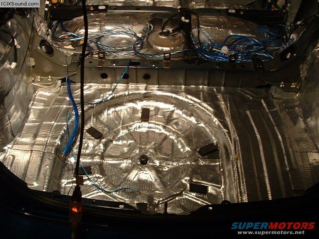 Car's rear interior with sound deadening material and wiring installed