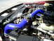 1995 Ford Crown Victoria - Custom blue intake piping installed in the engine bay of a 1995 Ford Crown Victoria.