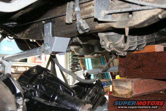 img_1034.jpg see both arms - note wooded cradle holding transfer case up