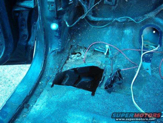 This was close to the body mount reinforcement, but not directly over it.