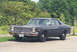 1978 Dodge Monaco - This dark gray sedan, possibly a 1977 model, is seen from a 3/4 front angle. The license plate is visible.