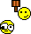 Two pixelated smiley faces, one with a hammer