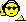 Pixelated yellow smiley face wearing sunglasses against a dark background