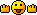 Pixelated yellow smiley face with arms raised and tongue sticking out