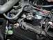 2000 Ford Crown Victoria - Close-up view of an engine wiring harness, showing a Motorcraft component and various connectors.