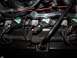 2000 Ford Crown Victoria - Close-up of an engine's wiring harness and ignition coils, showing Motorcraft parts.