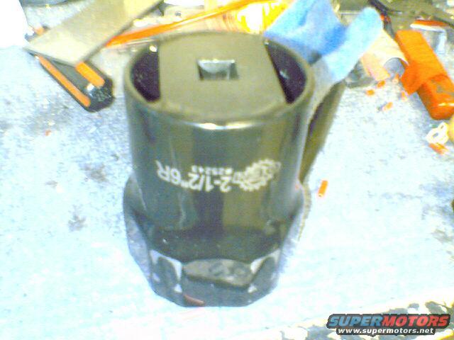 Close-up of a large socket wrench part with "2-1/2 6R" visible