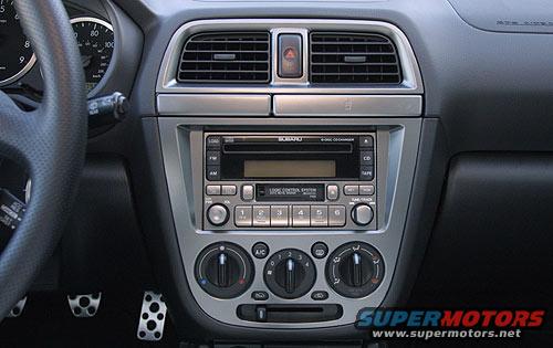 2004 Subaru Impreza interior dashboard with radio, climate controls, and steering wheel