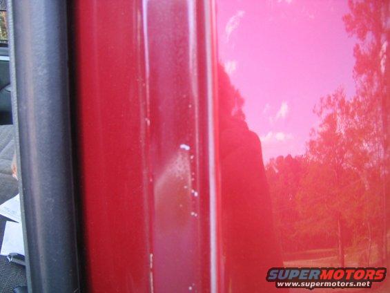 door-jamb.jpg Factory paint is inside the door jamb. New paint is on the outside.