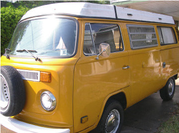 Yellow VW bus parked outside