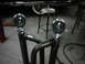 1978 Ford Bronco - Custom suspension rod ends are shown in detail, with a vehicle in the background.