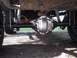 1990 Ford Bronco - Underside view of a vehicle's rear axle differential assembly.