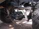 1990 Ford Bronco - The rear suspension and axle assembly of a vehicle are shown in detail.
