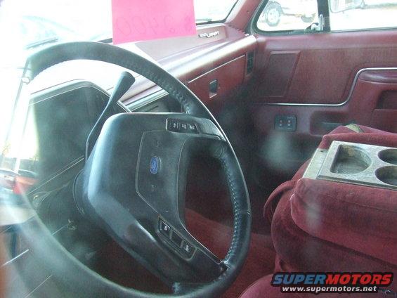1991 Ford C-350 (Centurion Conversions) interior showing steering wheel, dashboard, and center console