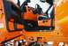 1989 Ford F-350 - Custom orange interior details visible through the open door of a lifted truck.