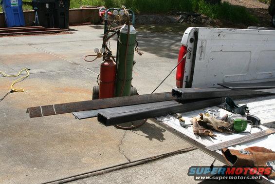 img_1078.jpg See the 2x4 cut to size - outside frame to outside fram - mine was 37 1/4 "
also see angle marked to be cut for bottom frame rail mount