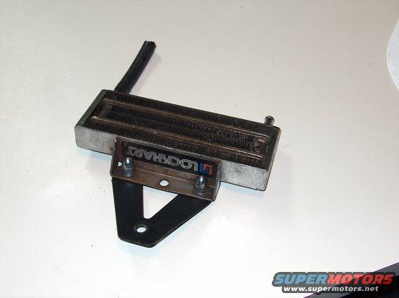 Oil cooler with Lockhart logo on mounting bracket