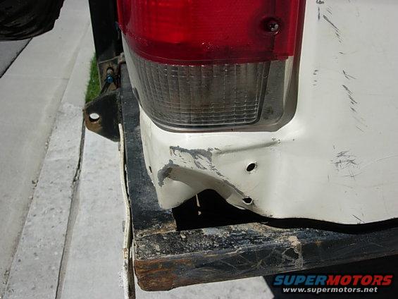 this-will-probably-be-next.jpg this little peice of metal is not long for this world, it gets bent into my tailight and makes it hard to replace broken tailights.  of course I should just get some cj style lights...