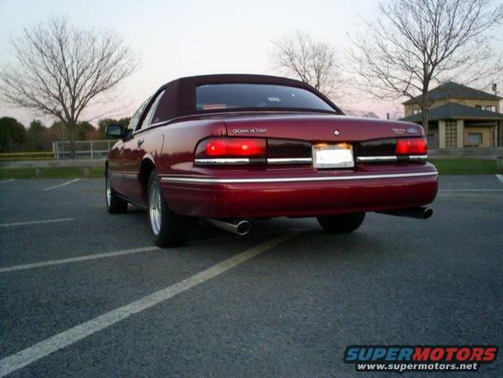 Red 1995 Ford Crown Victoria convertible, rear view