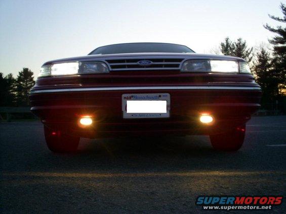 1995 Ford Crown Victoria front view with headlights and fog lights on