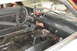1981 Ford Mustang - The interior of a 1981 Ford Mustang shows racing modifications including a roll bar and auxiliary gauges.