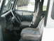 1995 Jeep Wrangler - Interior view of a 1995 Jeep Wrangler, focusing on the seats and driver's area.