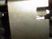 1981 Ford Bronco - Detail of a metal part, likely from machinery or a vehicle component.