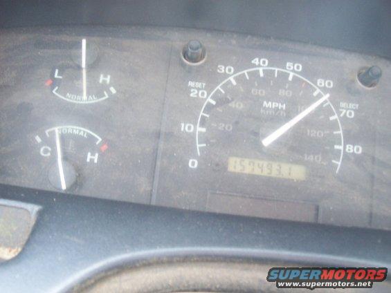 1994 Ford F-150 dashboard with speedometer, odometer showing 157493.1, and temperature/fuel gauges