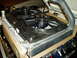 1966 Ford Fairlane - A close-up view of a dual electric fan setup attached to an aluminum radiator, likely for an engine cooling system.