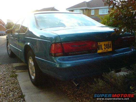 Teal 1994 Ford Thunderbird rear view