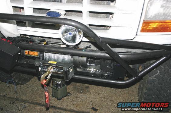 1995 Ford Bronco front bumper with aftermarket winch and brush guard