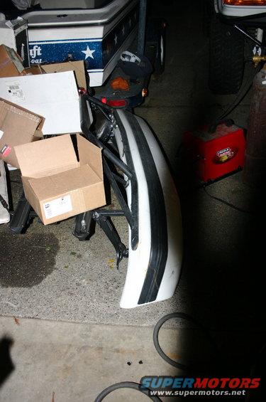 White and black striped bumper with black trim