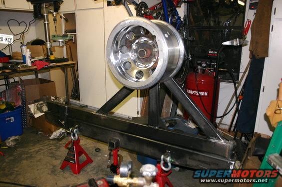 Custom tire carrier with chrome wheel assembly