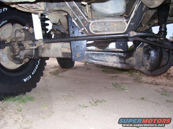 Undercarriage view showing suspension components and tires. Text on tire reads 'BFGoodrich Radial T/A'