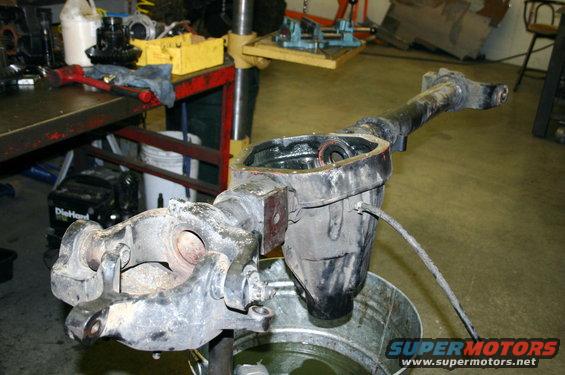 Differential housing and axle assembly in a workshop setting