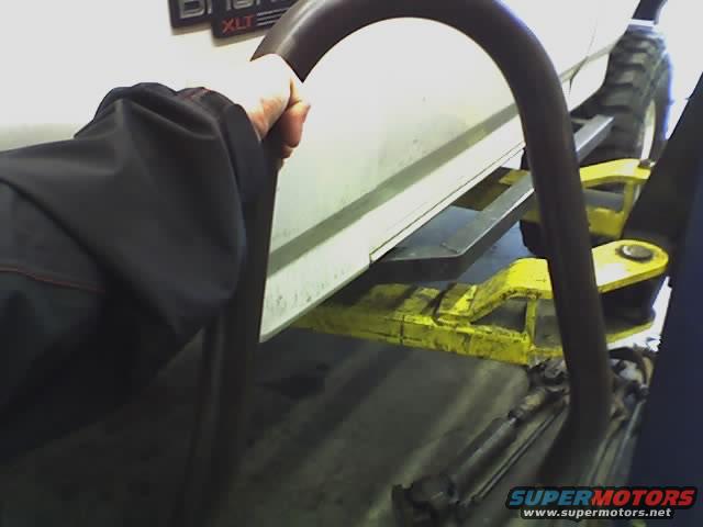 1995 Ford Bronco XLT side view on lift