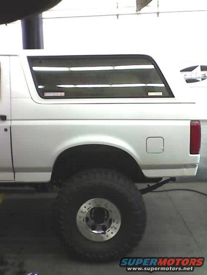 1995 Ford Bronco side view showing rear wheel and quarter panel