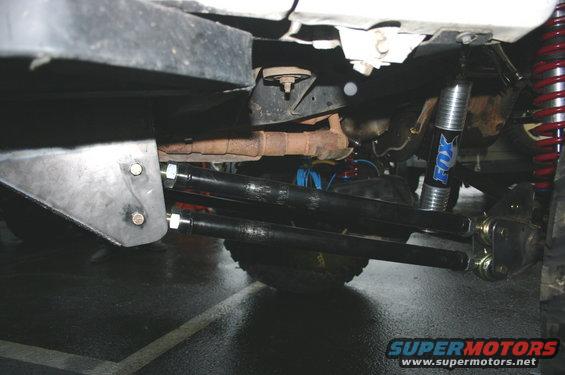 Undercarriage of a vehicle with Fox shocks and adjustable control arms