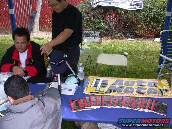 scpoc_021.jpg Auto Meter on display.  Also if you look closely you can see a clip board with my latest paint scheme for my race car.  I think everyone had something good to say about it.