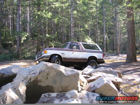 1987 Ford Bronco 3q-front view on rocks