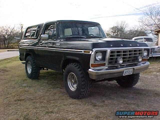 1978 Ford Bronco parked on grass, front 3/4 view. License plate PT-019