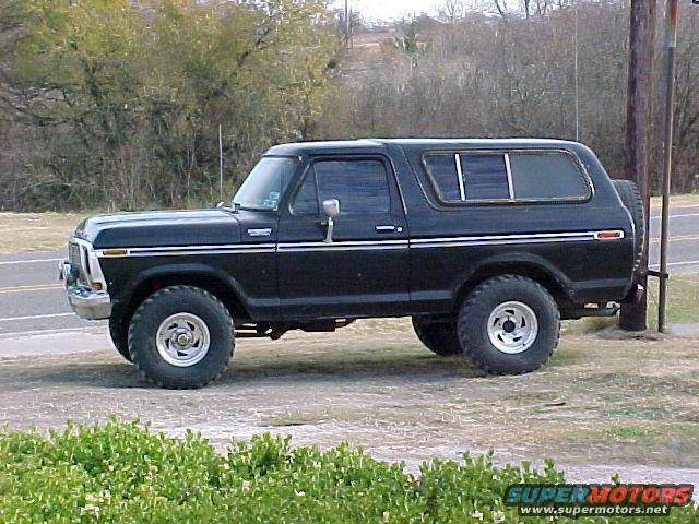 black 1978 Ford Bronco parked on dirt roadside
