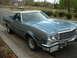 1975 Ford Ranchero - This 1975 Ford Ranchero is shown from a three-quarter front view, highlighting its chrome grille and bumper.