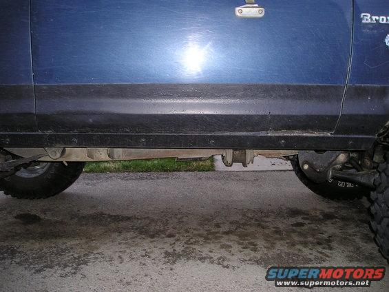 1986 Ford Bronco II side view showing lower body, black trim, and suspension components