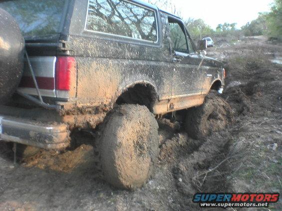 7.jpg By the time i frinnaly got a friend out there i had dug the 36's pretty deep tryin to rock it out, but got it wit a f250's big tug.