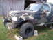 1988 Ford Bronco - This camouflaged Ford Bronco appears to be from the late 1980s, possibly a 1987 model, and is currently lifted on blocks.