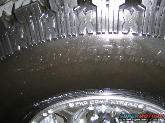 Close-up of a Pro Comp Xtreme tire with size 315/75R16 visible on the sidewall