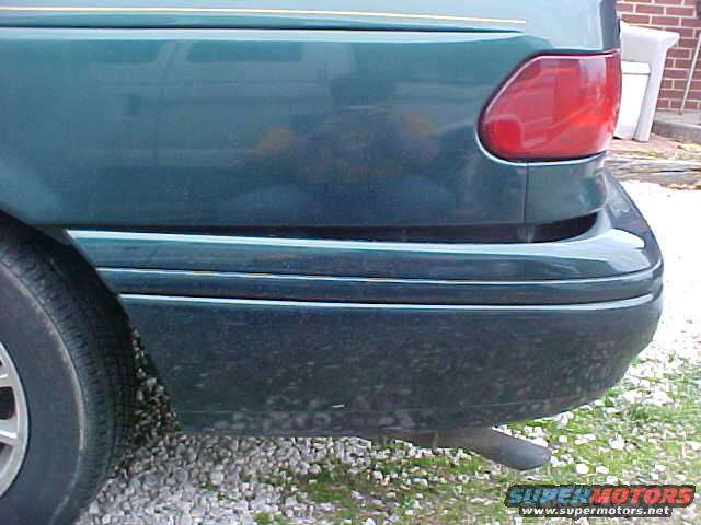 Driver side view of damage w/ a bad reflection shot...