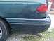 1995 Ford Taurus - Driver side view of damage w/ a bad reflection shot...